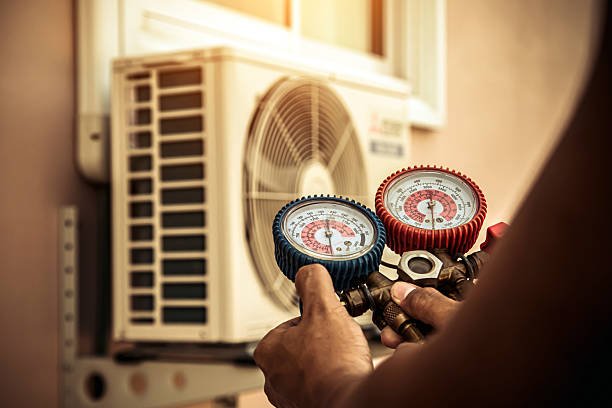 Professional Heat Pump Repair technician working in Finley, TN